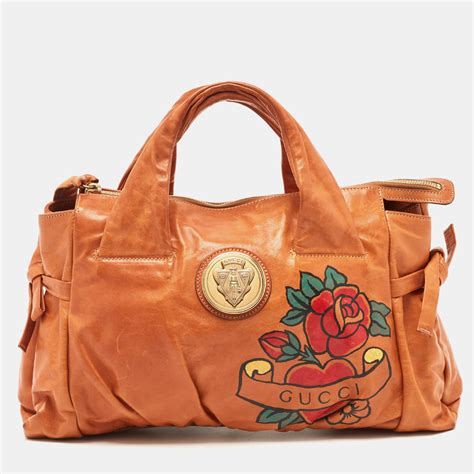 gucci tattoo purse|GUCCI Calfkin Tattoo Heart Large Hysteria Tote Tan.